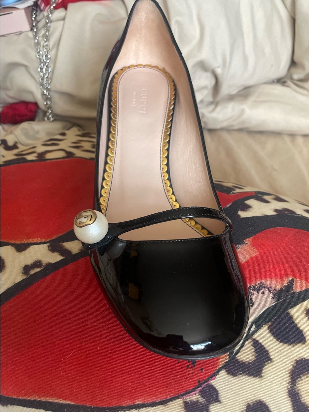 Gucci Black Patent Leather Pumps with Gold Sculpted Heel with a pearl GG